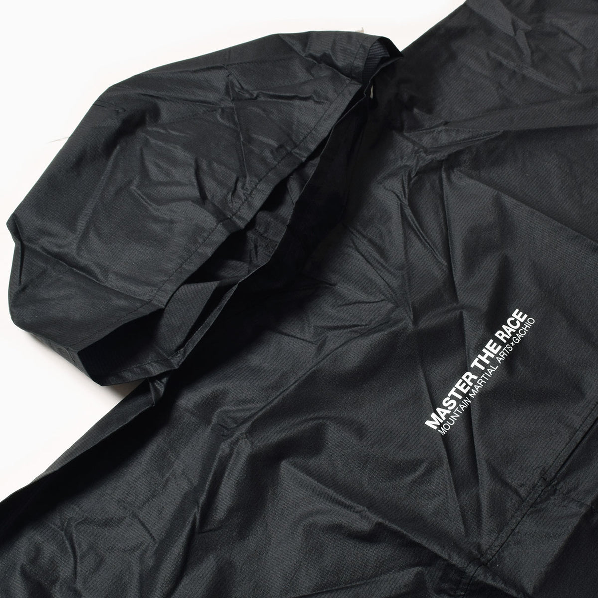 MMA GACHIO "MASTER THE RACE" Multi Big Poncho Black