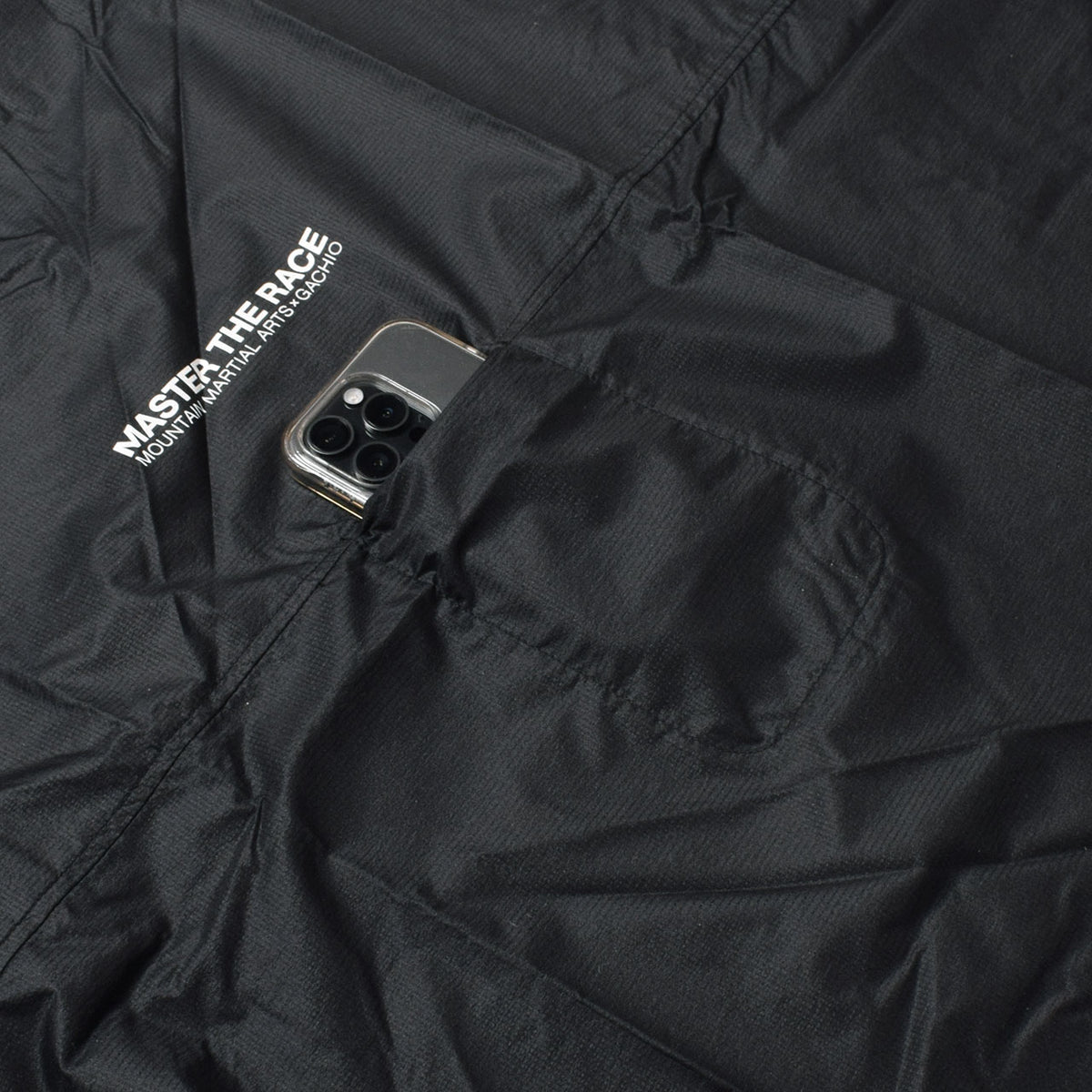 MMA GACHIO "MASTER THE RACE" Multi Big Poncho Black